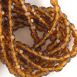 G105-197 4mm Faceted Dark Topaz Transparent