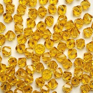 G150-131 4mm Bicones - Sunflower Transparent