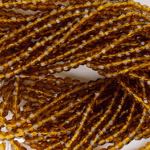 G103-197 3mm Faceted Rootbeer Transparent